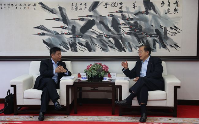 張學武董事長會見中金公司畢明建總裁（圖）